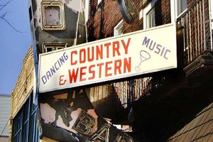 image of a building sign for a country western dance hall