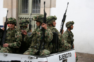Military police of Colombia on a truck (image from Wikimedia Commons))