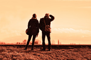 Illustration - 2 people standing in open field