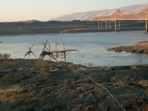 Indigenous Fishing scaffolds by The Dalles Dam Indigenous Fishing scaffolds by The Dalles Dam
