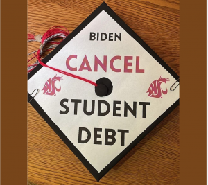 A graduation mortar board that reads "Biden Cancel Student Debt" with the WSU logo