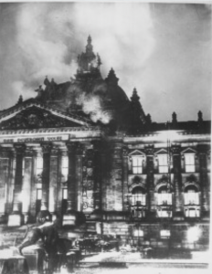 A black and white image of the Reichstag fire in Germany, 1933