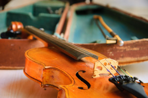 Picture of a violin laying on its case