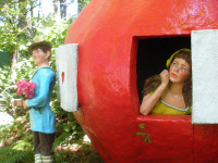 Statue of Peter, Peter, Pumpkin Eater at theme park, woman looking out of the side of a pumpkin while man stands outside Feminism, fairy tales, Peter Peter Pumpkin Eater, Violence Against Women, Patriarchy