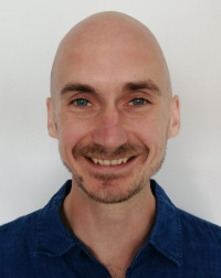 Dr. Adam Holland, a Clinical Research Training Fellow in the School of Psychological Science at the University of Bristol and an Honorary Research Fellow at Bristol Medical School