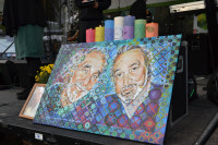 Pot Illuminati candles alongside portrait of Eddy Lepp and Jack Herer Pot Illuminati candles alongside portrait of Eddy Lepp and Jack Herer
