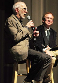 Nick Licata with journalist John Nichols in the background